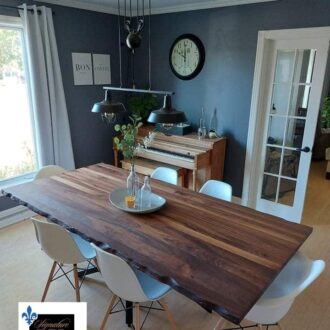 Table La Coureuse des Bois in walnut with central foot
