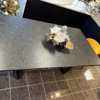 Granite St-Henry table with antique finish